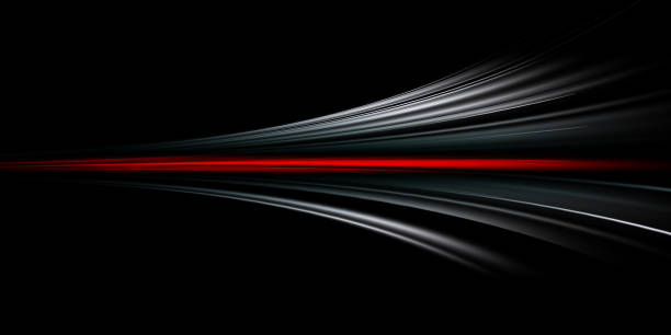 istock Abstract background of long exposure red tale light on black ,Technology background 1493418448