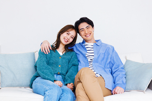 Japanese couple smiling at the camera