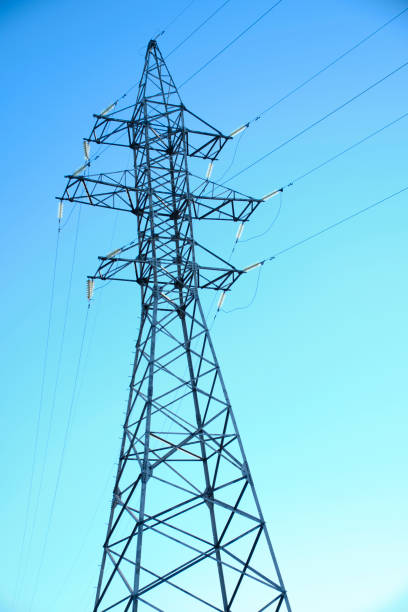 istock Metal support power line against blue sky. 1493419503