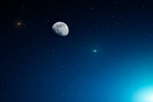 istock Moon on background starry sky in blue light earth. 1493419513