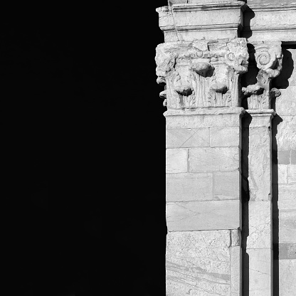 detail of the columns in a building located in the Milan duomo square.