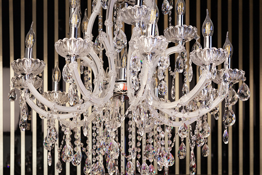 Chrystal chandelier close up. Glamour background with copy space