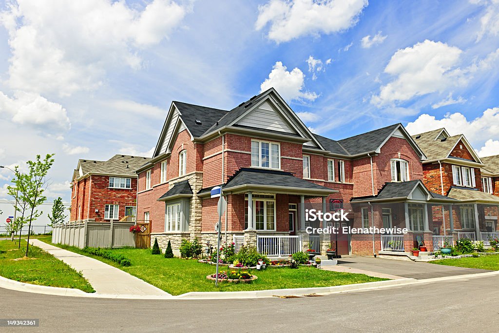 Suburban homes Suburban residential street with red brick houses Architecture Stock Photo