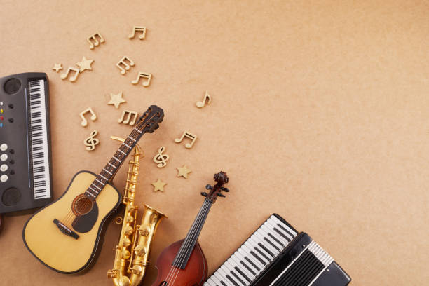 istock Happy world music day. Musical instruments on brown background. 1493424117