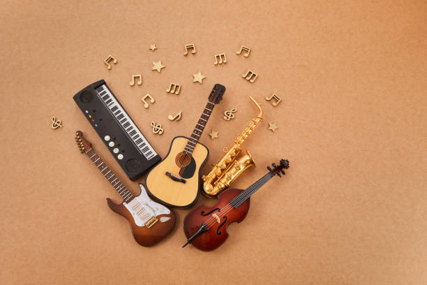 istock Happy world music day. Musical instruments on brown background. 1493424475
