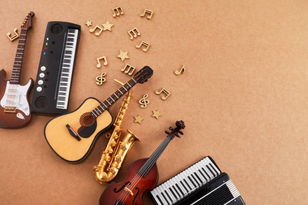 istock Happy world music day. Musical instruments on brown background. 1493425514