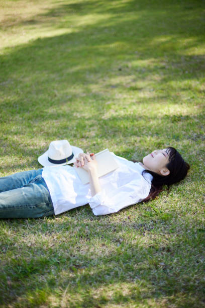 Japanese woman relaxing at forest