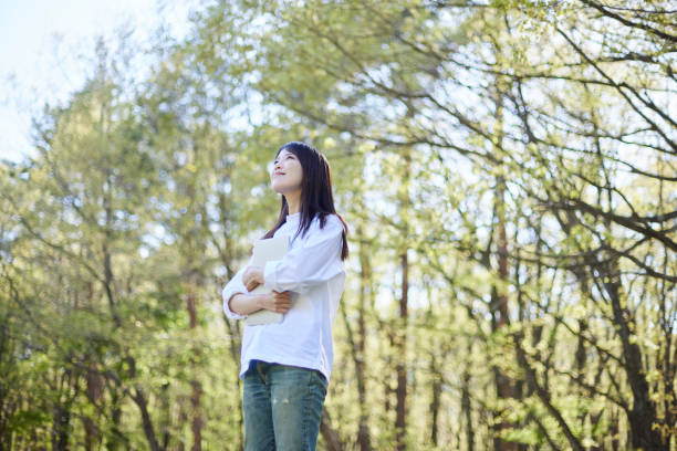 Japanese woman relaxing at forest