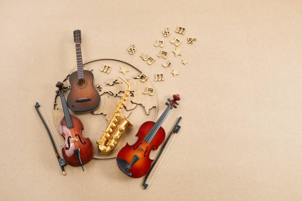 istock Happy world music day. Musical instruments with globe background. 1493425679