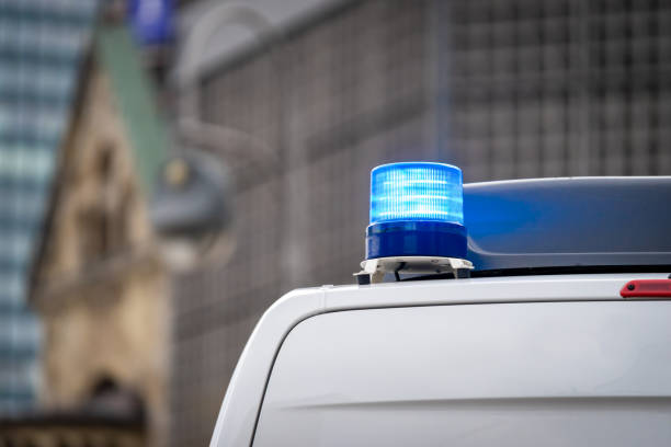 istock Close up of police car blue flash light 1493425875