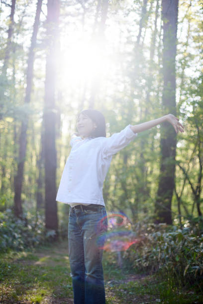 Japanese woman relaxing at forest