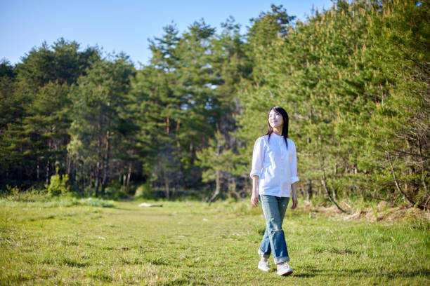Japanese woman relaxing at forest