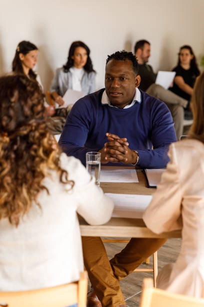 istock Confident client sharing his work experience during a job interview with two businesswomen 1493427801