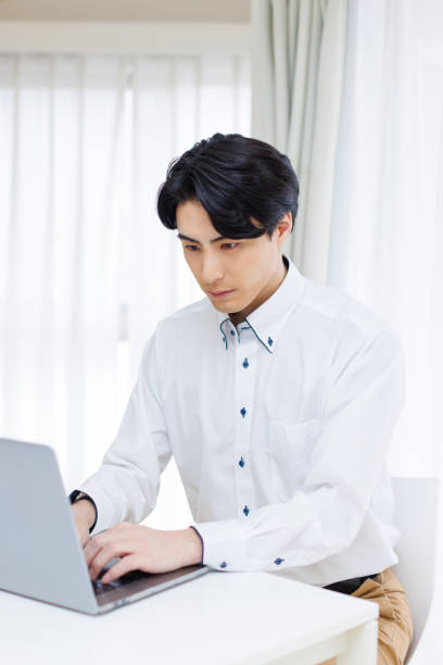 istock Japanese man working at home 1493429204
