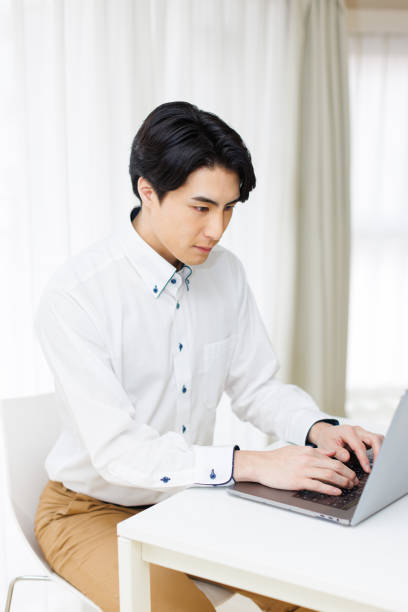istock Japanese man working at home 1493429242