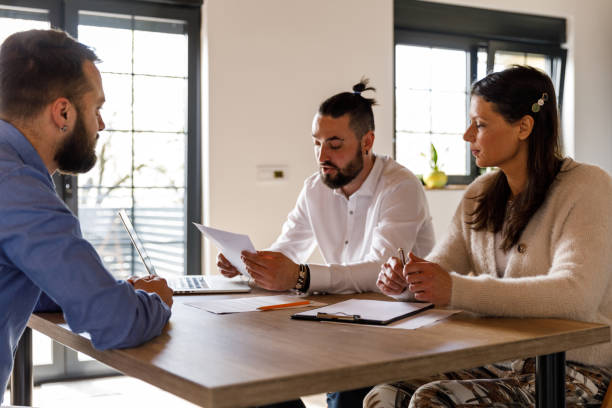 istock Interviewers analyzing a resume and questioning a person applying for the job 1493430932