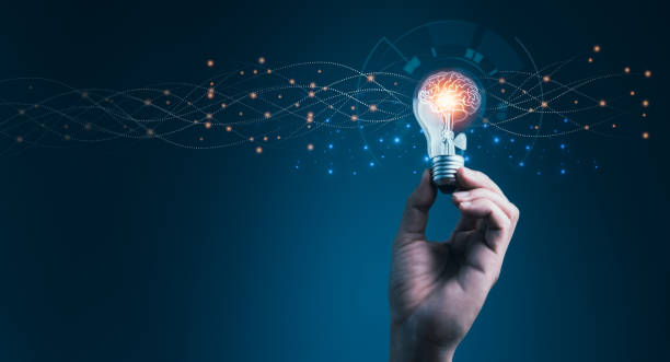 istock Man holding illuminated light bulb like as business innovation idea and creativity brainstorming 1493431789