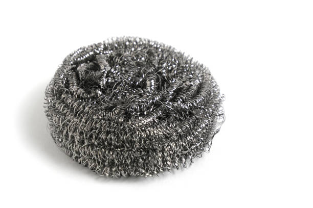 istock Metal sponge for washing dishes white background. 1493436082