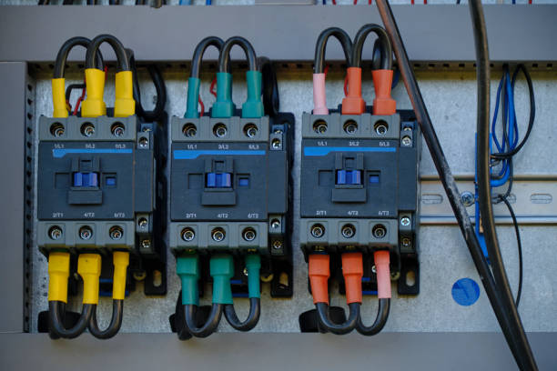 istock Electric switches with wires electrical panel. 1493436130