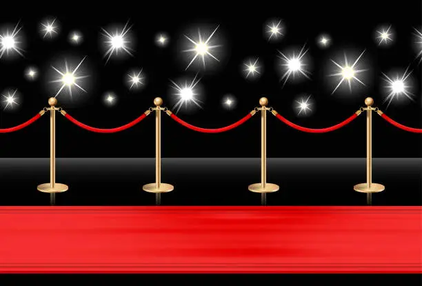 Vector illustration of Red carpet on the floor and golden barriers with sparkling spotlights. Realistic isolated fence with rope on black background. Vector illustration.