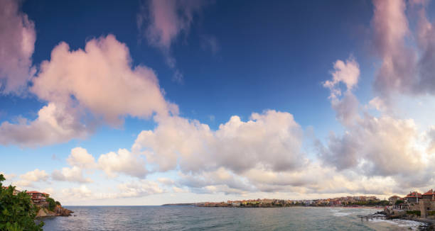 istock panorama with fluffy clouds on a blue sky in evening light 1493440877