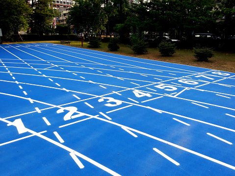 Stadium track or track for athletes. Tracks are rubber man-made tracks used in athletics.