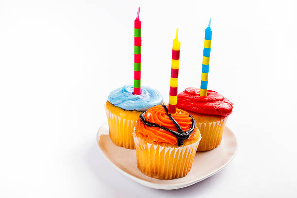 Cupcakes with candles. stock photo