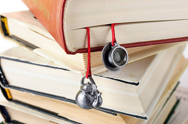 istock Stack of used books with a hand-made bookmark 149344718