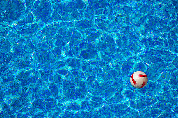 istock Beach ball floating in swimming pool 149344730