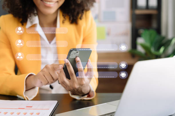 istock young women chatting correspondence with friends online using smartphone, read messages. 1493449354