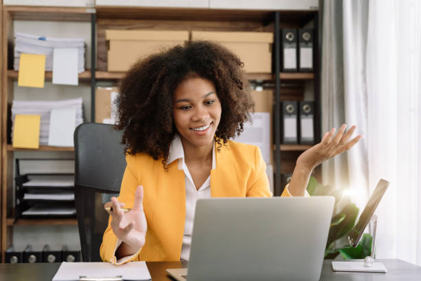 istock Businesswoman involved in laptop call conversation working on computer, giving professional consultation to client or negotiating project. 1493449616