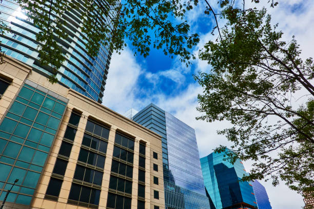 istock office building against blue sky with clouds 1493452351