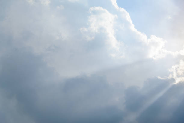 istock Scattered cloud clusters in a blue sky, blue sky background with white clouds. 1493453080