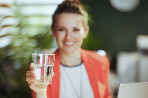 istock smiling modern small business owner woman at work 1493455690