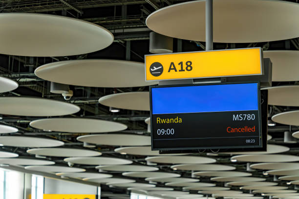 istock Airport flight canceled sign for flight to Rwanda 1493459324