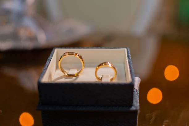 istock Gold wedding rings illuminated by soft light, a perfect representation of love and commitment 1493459479