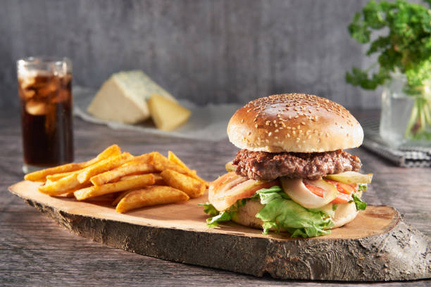 istock Delicious hamburger and fries 1493460554