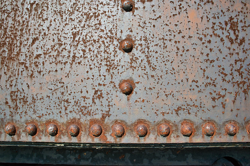 Old rusty steam locomotive rivets detail