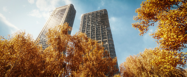 Digitally generated tall old ruins of two office buildings on a sunny autumn day.\n\nThe scene was created in Autodesk® 3ds Max 2024 with V-Ray 6 and rendered with photorealistic shaders and lighting in Chaos® Vantage with some post-production added.