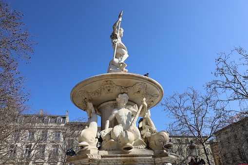 Monument Piramide del Mayo in white stone at the center of Plaza Mayo, Buenos Aires, Argentina