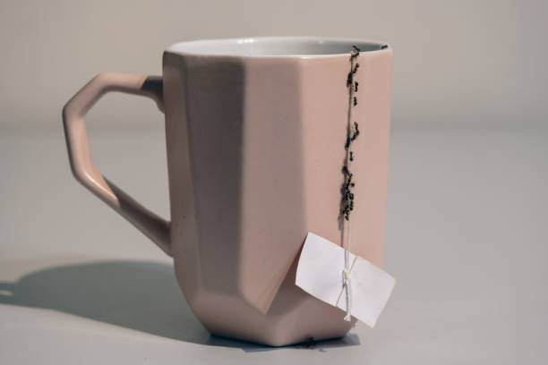 istock Ants in the house - falling on a pink mug 1493464111