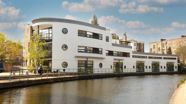 Exterior of modern white round shape Flats house object on Regents Canal in London, England. Real estate, residential apartments and offices. Living apartments or office building architecture Exterior of modern white round shape Flats house object on Regents Canal in London, England. Real estate, residential apartments and offices. Living apartments or office building architecture wharfe river photos stock pictures, royalty-free photos & images