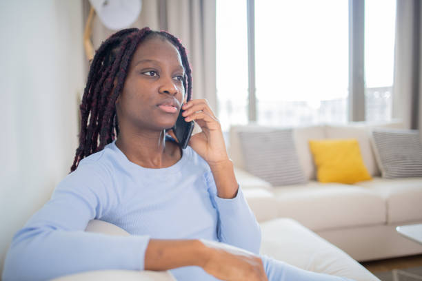 istock Happy young woman using phone 1493469130