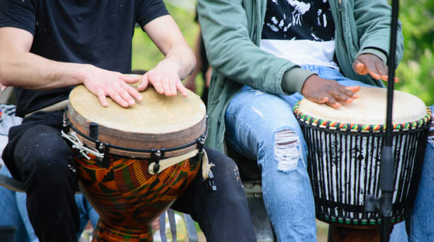 istock Drummer hands playing the ethnic djembe drum. 1493483495