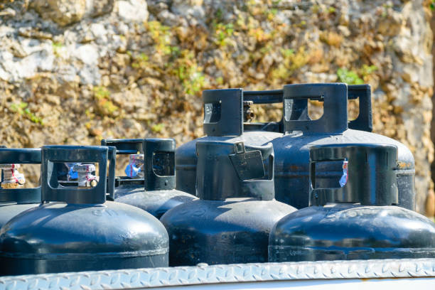 close up do conjunto de cilindros de gás azul - natural gas cylinder flammable fire - fotografias e filmes do acervo