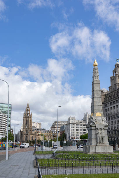 All heroes of the marine engine room memorial in front of the Royal Liver building Liverpool, England Liverpool, united kingdom May, 16, 2023 All heroes of the marine engine room memorial in front of the Royal Liver building Liverpool, England titanic room stock pictures, royalty-free photos & images