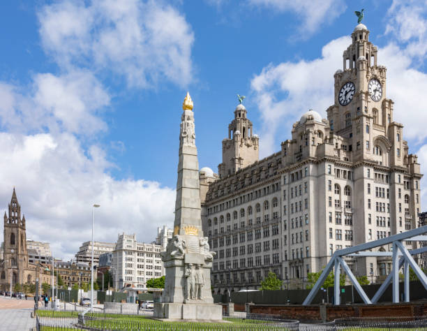 All heroes of the marine engine room memorial in front of the Royal Liver building Liverpool, England Liverpool, united kingdom May, 16, 2023 All heroes of the marine engine room memorial in front of the Royal Liver building Liverpool, England titanic room stock pictures, royalty-free photos & images