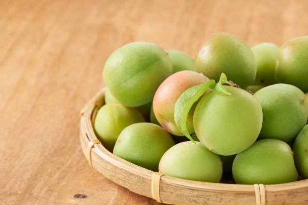 istock Japanese apricot on wooden table 1493488272