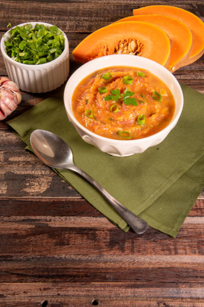 istock Homemade pumpkin cream, accompanied by spices. pumpkin broth 1493492788