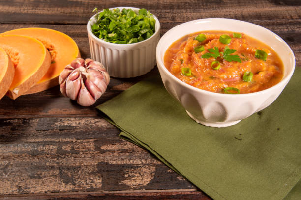 istock Homemade pumpkin cream, accompanied by spices. pumpkin broth 1493492816